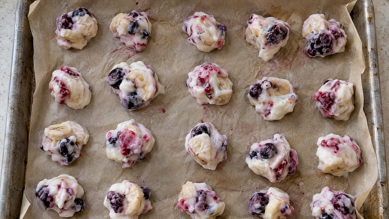 Berry and banana yogurt bites on parchment