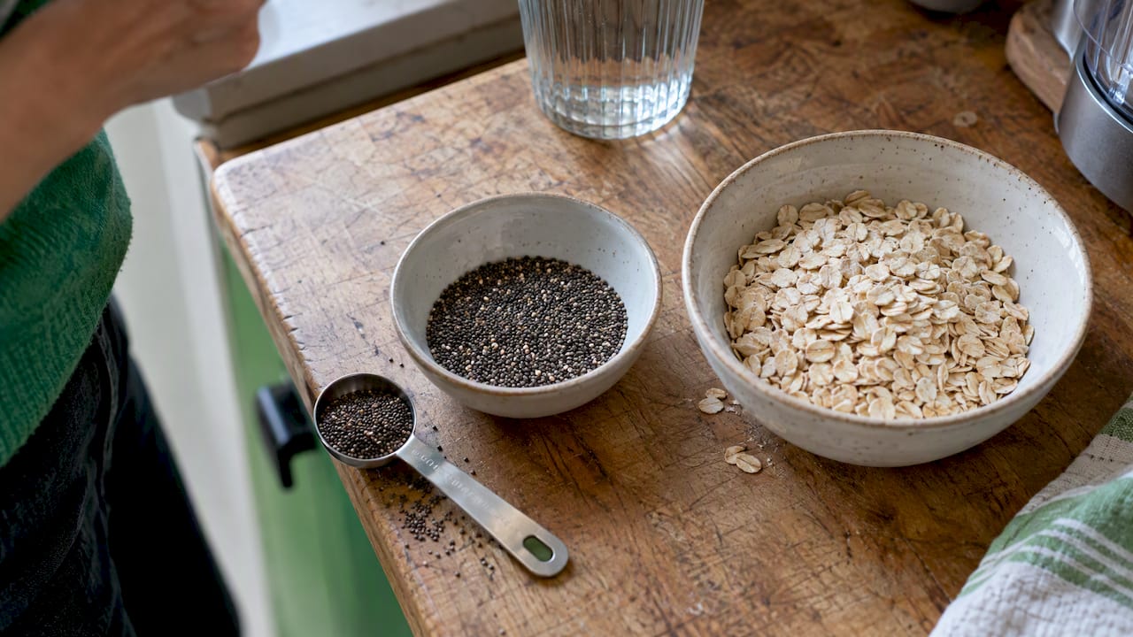 Chia seeds and rolled oats measured for smoothies